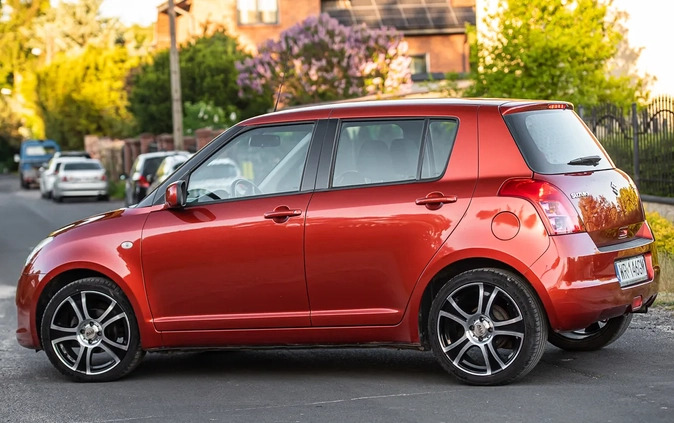 Suzuki Swift cena 18900 przebieg: 136000, rok produkcji 2009 z Rymanów małe 407
